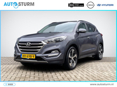 Hyundai Tucson 1.6 t-gdi premium 4wd | trekhaak | panoramadak | dodehoek | navigatie | camera | leder | stuur- + stoelverwarming | rijklaarprijs!