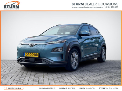 Hyundai Kona ev premium 64 kwh | head-up display | stuur- + stoelverwarming | leder | navigatie | camera | adapt. cruise control | rijklaarprijs!