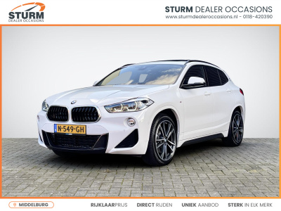 BMW X2 xdrive20i high executive m sport | trekhaak afneembaar | panoramadak | navigatie full-map | stoelverwarming | elek. kofferklep | camera | rijklaarprijs!