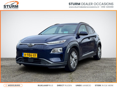 Hyundai Kona ev fashion 64 kwh design pack | head-up display | stoelverwarming | ½ leder | adapt. cruise control | dodehoek detectie | rijklaarprijs!