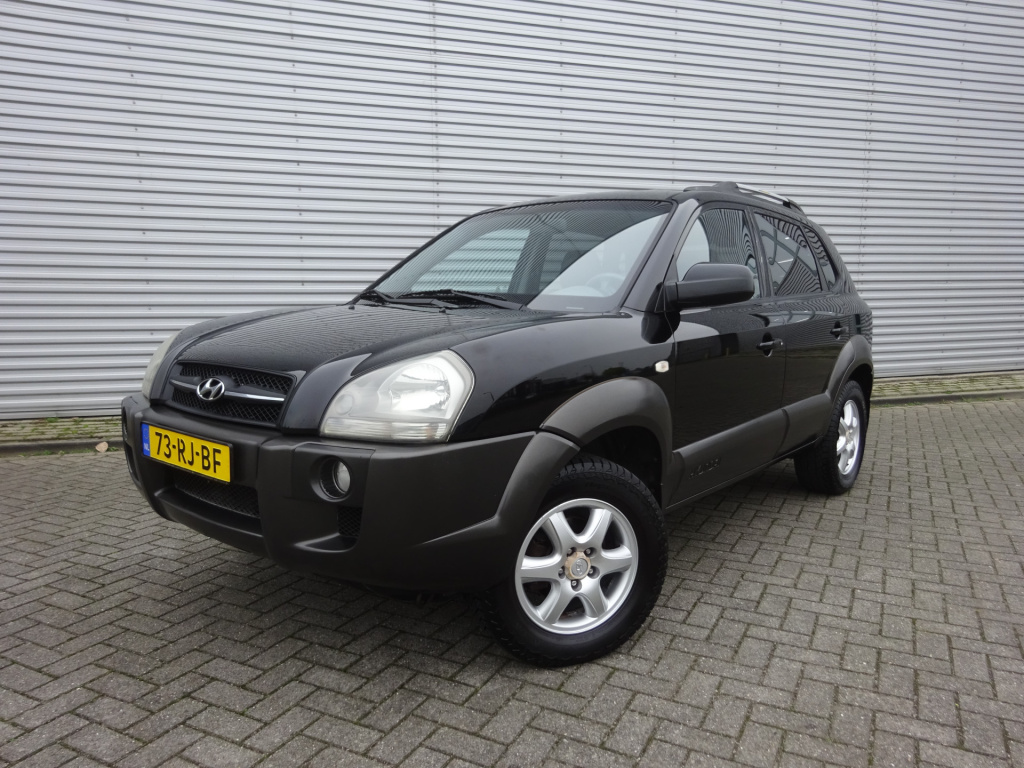 Hyundai Tucson 2.0i dynamic airco / leder / trekhaak / lm velgen