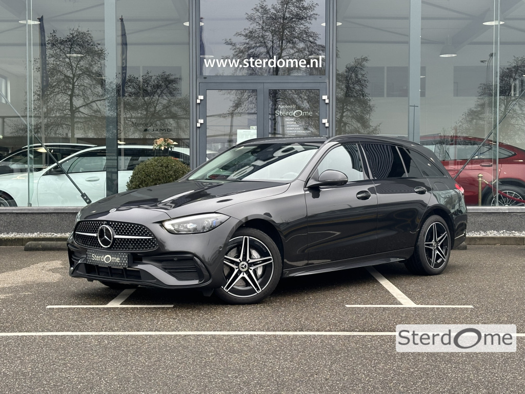 Mercedes-Benz C-Klasse estate 300 e amg line l distronic l mbux l stoelverwarming l digital light l night pakket l 360 gr camera l smart phone integratie l niveau regeling l sfeerverlichting l wegklapbare trekhaak l multicontourstoelen l airco l