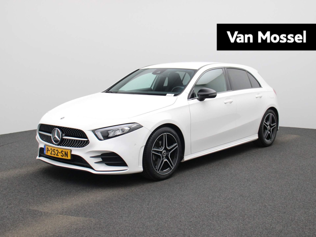 Mercedes-Benz A-Klasse 180 business solution amg | automaat | trekhaak | lmv | sfeer verlichting | virtual cockpit | stoel verwarming | dab | camera | navigatie | parkeer sensoren